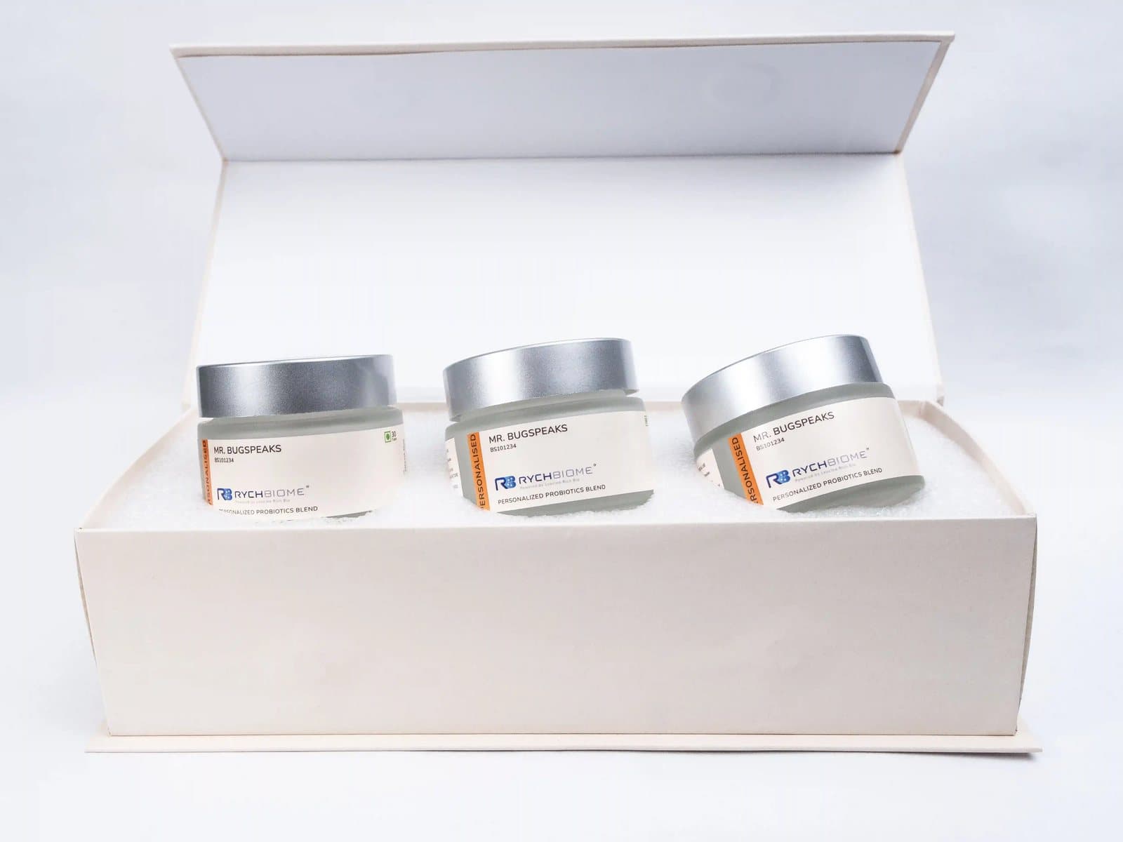 The open personalised probiotic box with its three jars